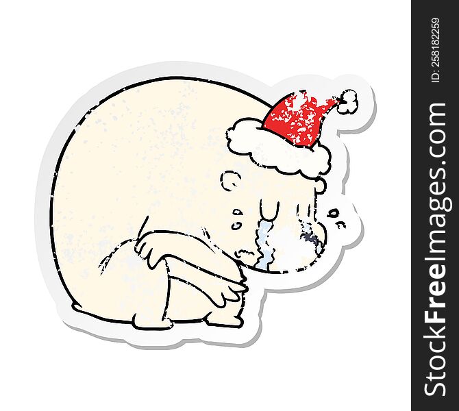 crying hand drawn distressed sticker cartoon of a polar bear wearing santa hat