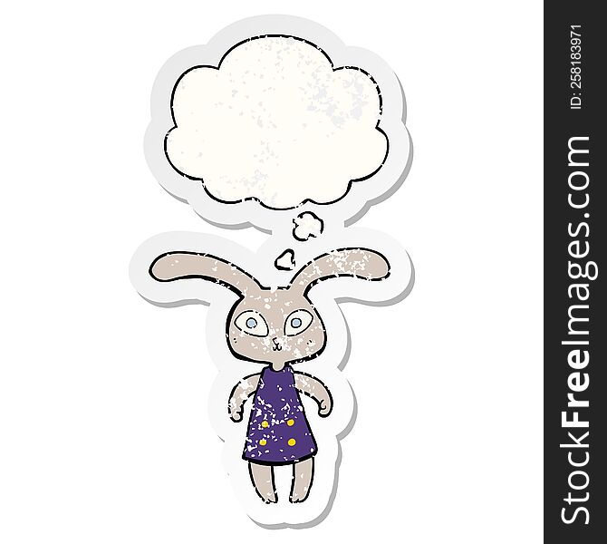 cute cartoon rabbit with thought bubble as a distressed worn sticker