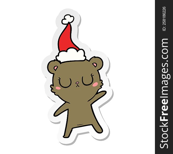 peaceful sticker cartoon of a bear wearing santa hat