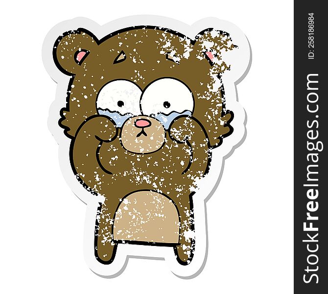 distressed sticker of a cartoon crying bear rubbing eyes