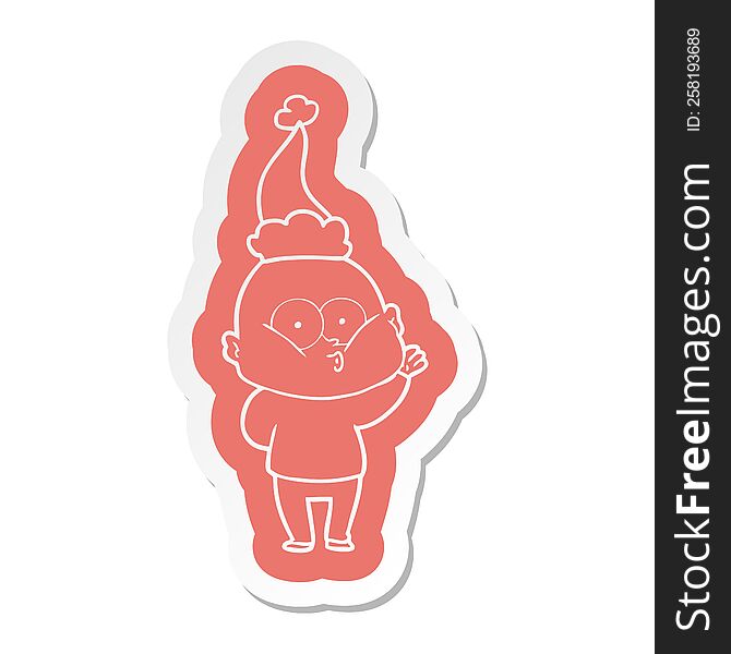 quirky cartoon  sticker of a bald man staring wearing santa hat