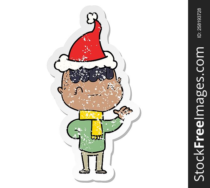 Distressed Sticker Cartoon Of A Friendly Boy Wearing Santa Hat