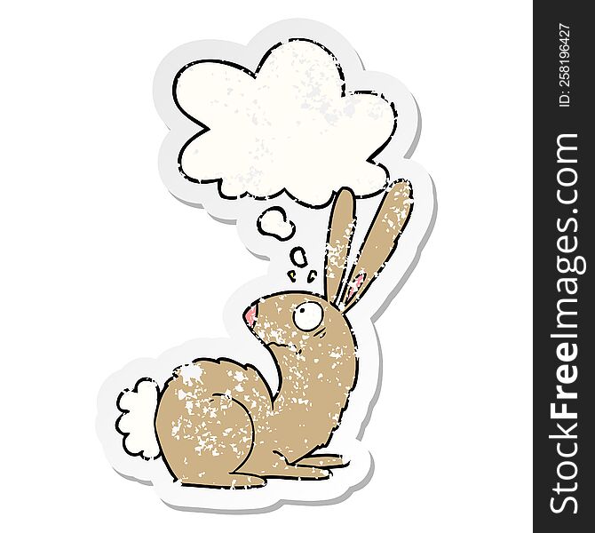 Cartoon Startled Bunny Rabbit And Thought Bubble As A Distressed Worn Sticker