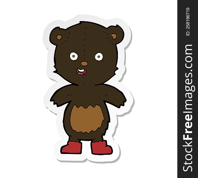 sticker of a cartoon happy teddy bear in boots