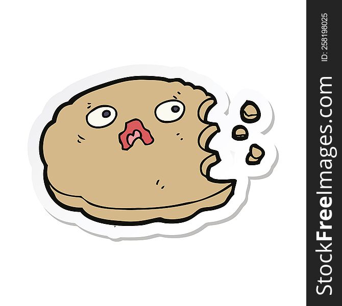 sticker of a cartoon bitten cookie