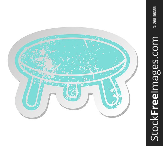 Distressed Old Sticker Of A Wooden Stool