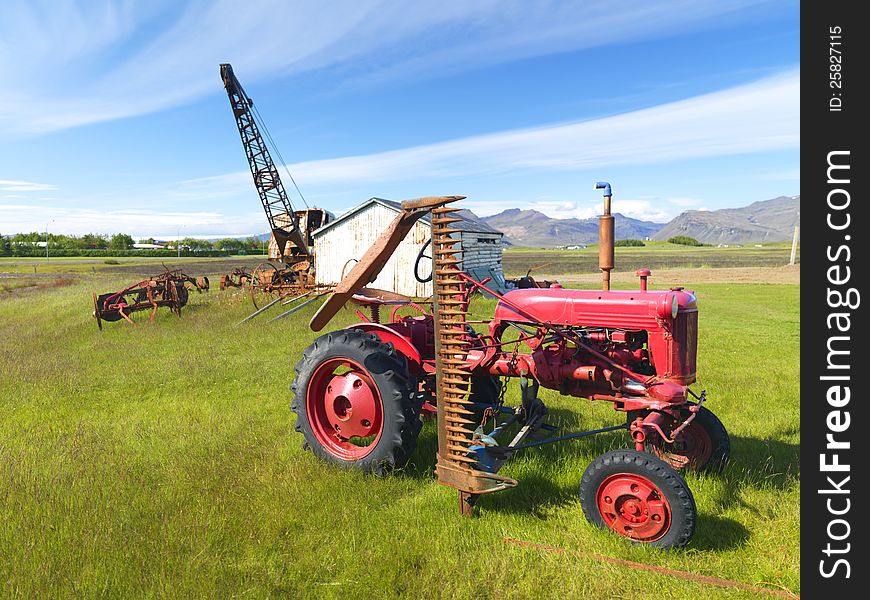 Picture of a tractor and abandoned machines