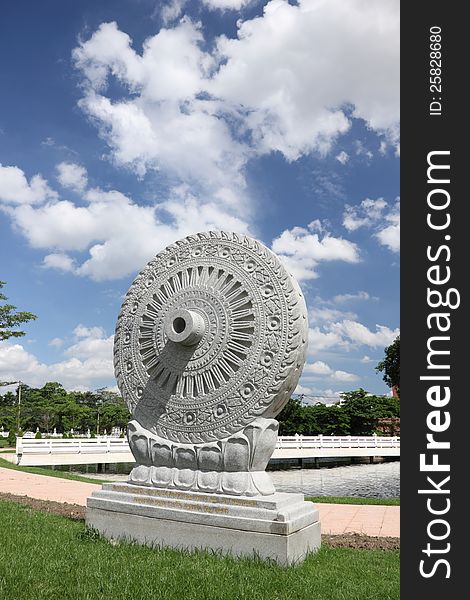 Wheel of Dhamma the sign of Buddhism at Wat Phra Sri Mahathat temple, Bangkok, Thailand. Wheel of Dhamma the sign of Buddhism at Wat Phra Sri Mahathat temple, Bangkok, Thailand.