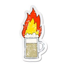 Retro Distressed Sticker Of A Cartoon Flaming Tankard Of Beer Stock Photo