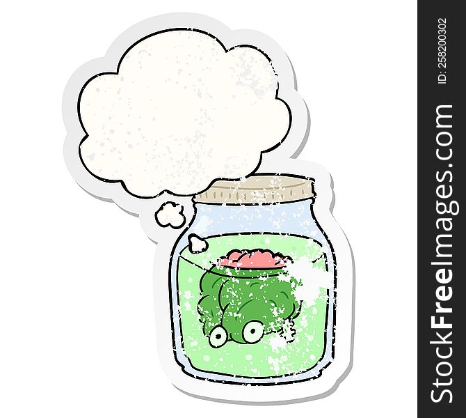 cartoon spooky brain in jar with thought bubble as a distressed worn sticker