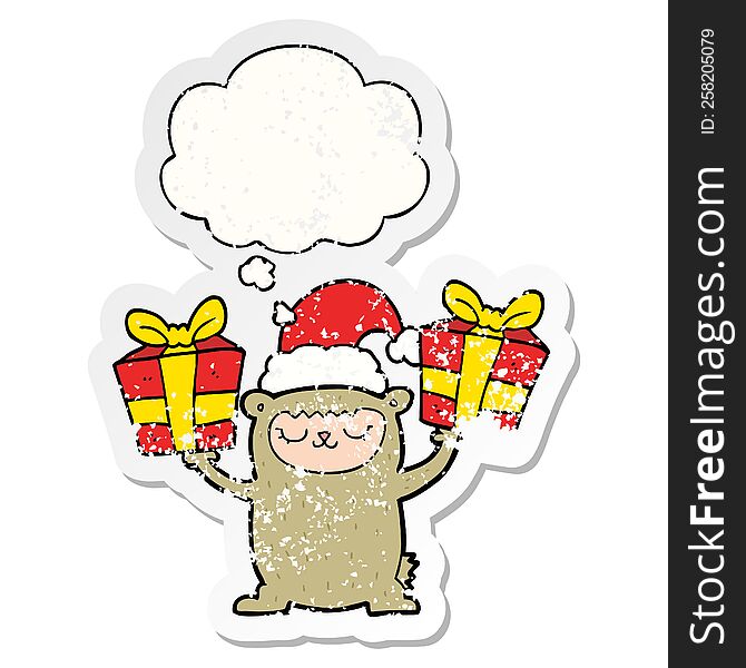 cartoon christmas bear with thought bubble as a distressed worn sticker