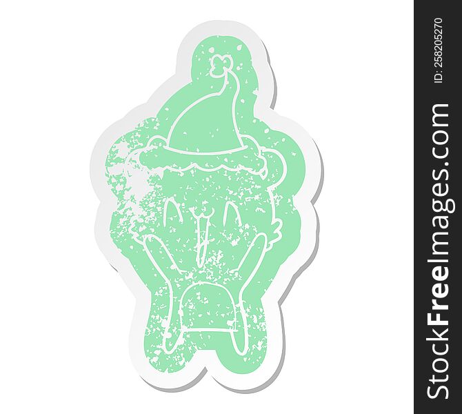 happy bear quirky cartoon distressed sticker of a wearing santa hat