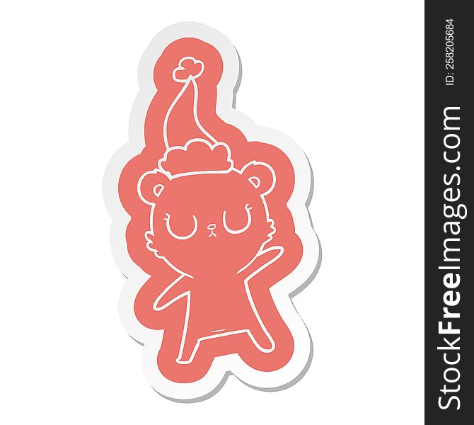 peaceful quirky cartoon  sticker of a bear wearing santa hat