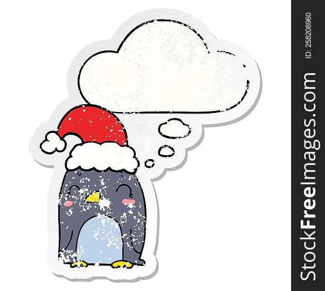 Cute Christmas Penguin And Thought Bubble As A Distressed Worn Sticker