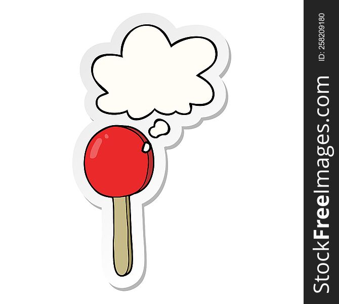cartoon lollipop with thought bubble as a printed sticker