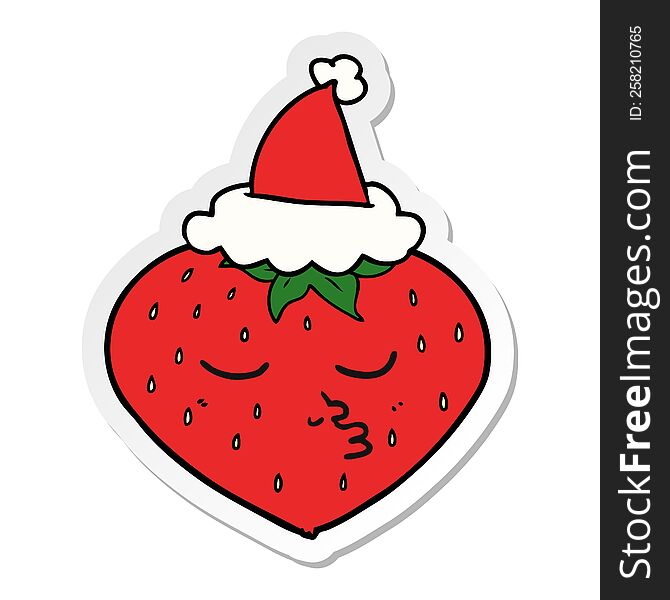 Sticker Cartoon Of A Strawberry Wearing Santa Hat
