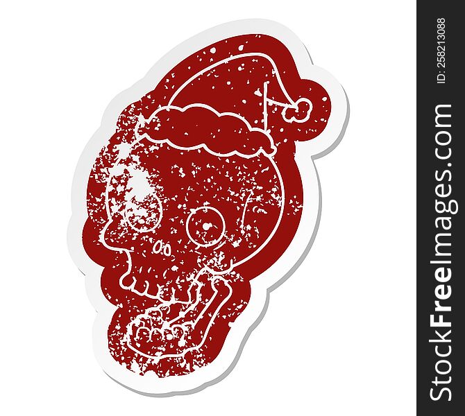 Cartoon Distressed Sticker Of A Skull Wearing Santa Hat