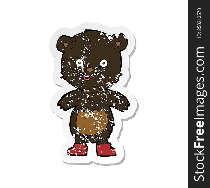 retro distressed sticker of a cartoon happy teddy bear in boots