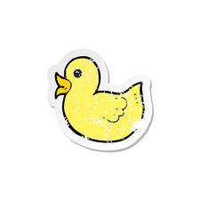 Retro Distressed Sticker Of A Cartoon Rubber Duck Royalty Free Stock Photo
