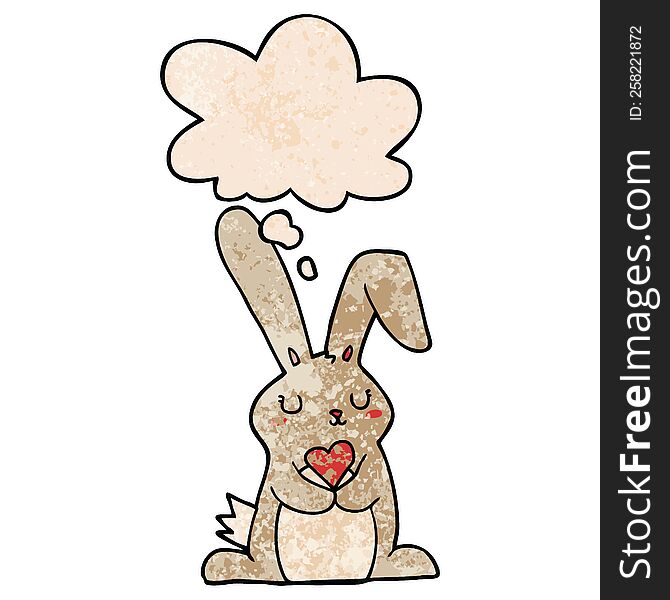 cartoon rabbit in love with thought bubble in grunge texture style. cartoon rabbit in love with thought bubble in grunge texture style