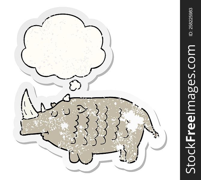 cartoon rhinoceros and thought bubble as a distressed worn sticker