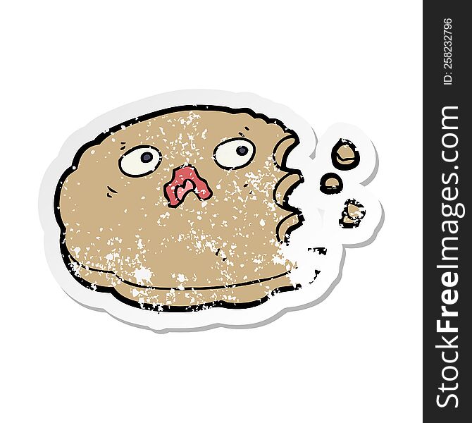 distressed sticker of a cartoon bitten cookie