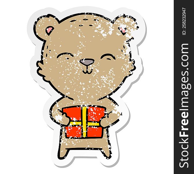Distressed Sticker Of A Happy Cartoon Bear With Gift