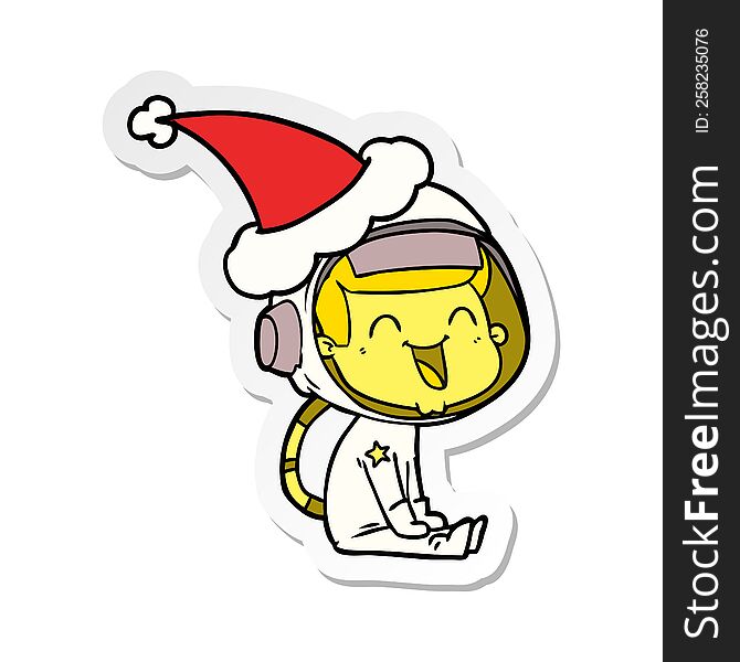 happy hand drawn sticker cartoon of a astronaut wearing santa hat. happy hand drawn sticker cartoon of a astronaut wearing santa hat