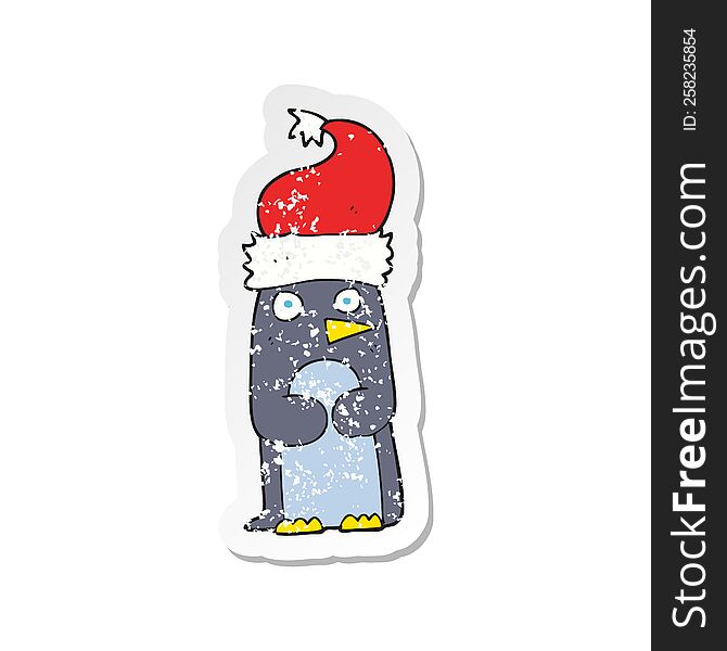 retro distressed sticker of a cartoon penguin in christmas hat