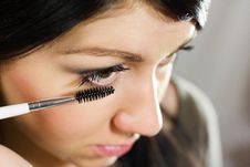 Beautiful Woman Applying Mascara On Her Eye Royalty Free Stock Photography Beautiful Woman Applying Mascara On Her Eye Royalty Free Stock Photography
