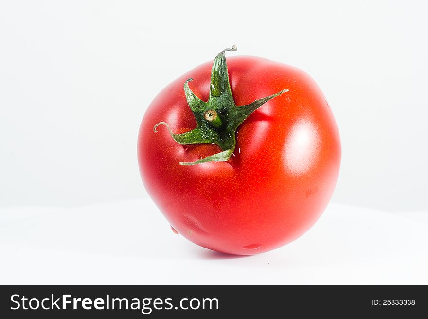 Fresh tomato, isolated on white background