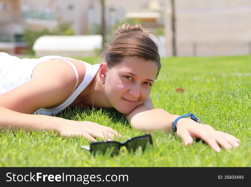 Portrait Of A Girl On Grass