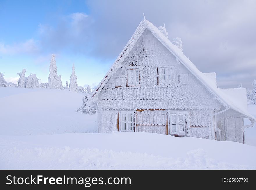 Hut in mountains with blue sky. Hut in mountains with blue sky