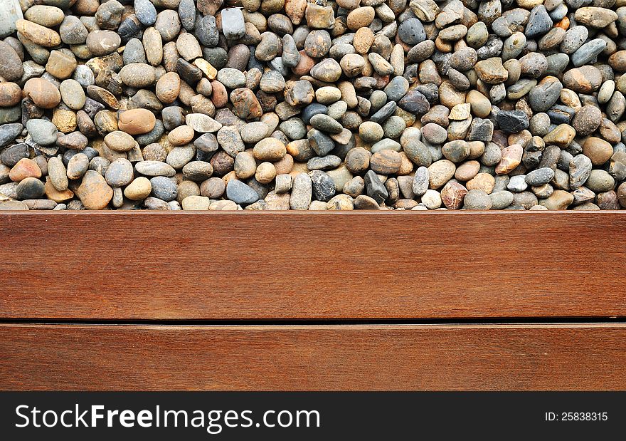 Pebble stone and wood texture. Pebble stone and wood texture