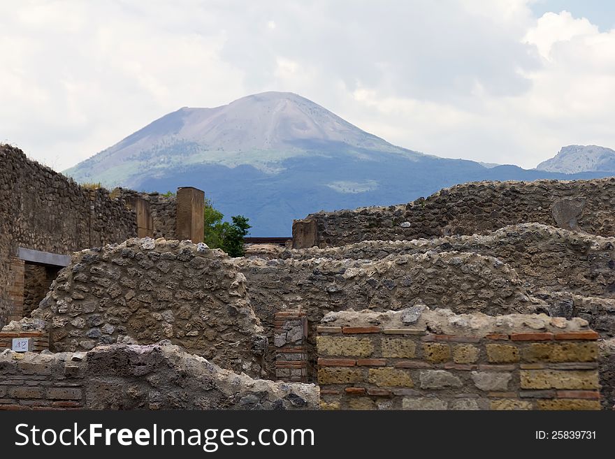 Vesuvius Volcano overlooking the ruins of Pompeii which was buried in AD79 by an eruption. Vesuvius Volcano overlooking the ruins of Pompeii which was buried in AD79 by an eruption