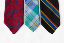 Neckties On White Cloth Stock Photography
