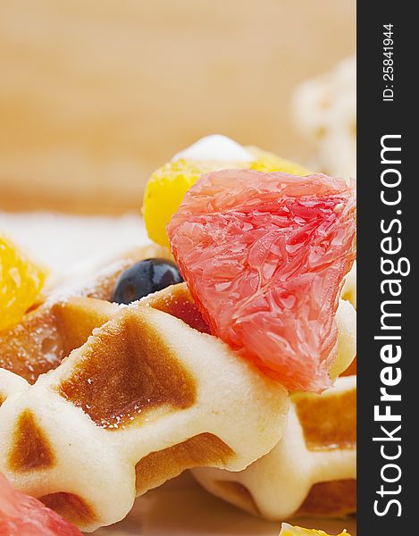 Belgian waffles and fruits for breakfast