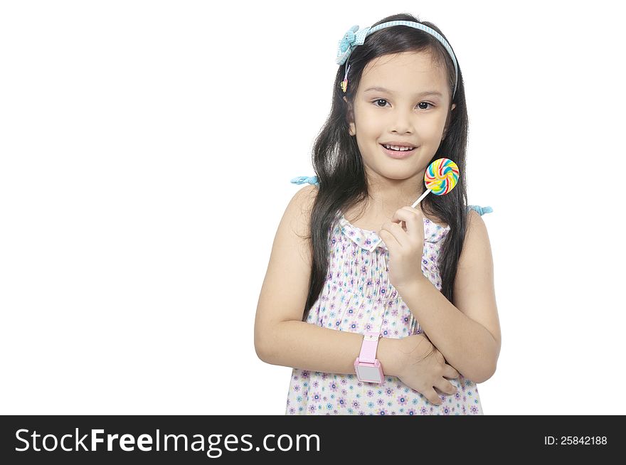 Mix race asian caucasian girl eating lollipop isolated over white background
