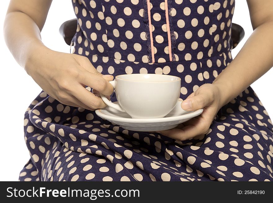 Woman wearing retro dress hold a cup of coffee. Woman wearing retro dress hold a cup of coffee