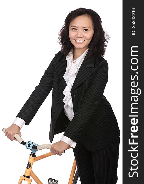 Asian business woman using bike to go work. Asian business woman using bike to go work