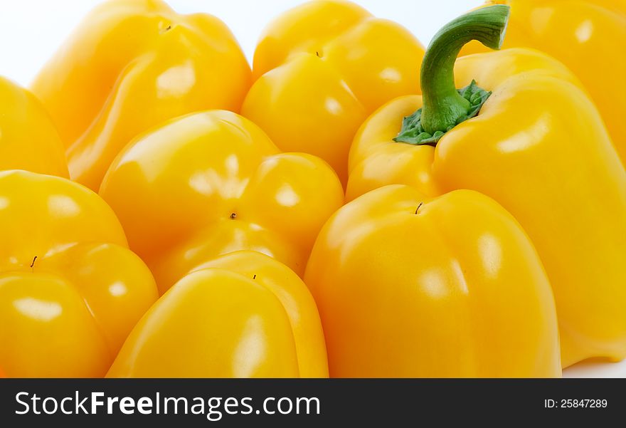 Yellow Bell Peppers close up on white background