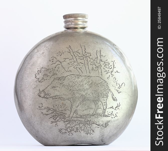 Hunting flask with boar image over white