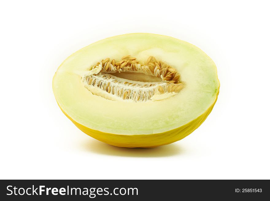 Half of yellow melon on white background