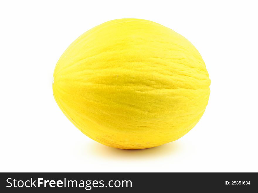 Ripe and delicious yellow melon on white background