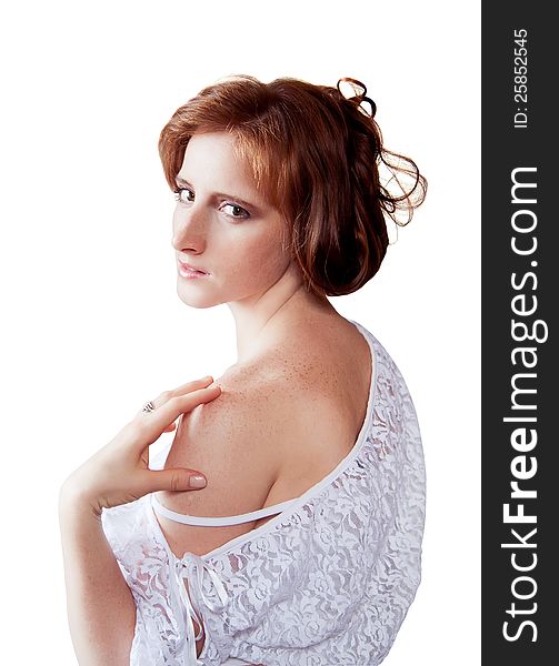 Portrait of red-haired girl on white background