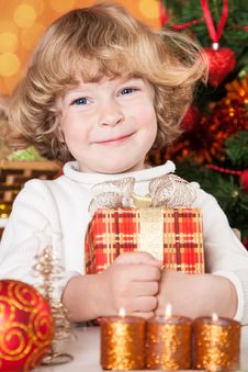 Happy Child Holding Gift Box Royalty Free Stock Images Happy Child Holding Gift Box Royalty Free Stock Images