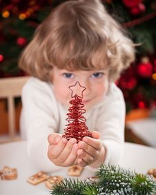 Happy Child Holding Xmas Decoration Stock Image Happy Child Holding Xmas Decoration Stock Image