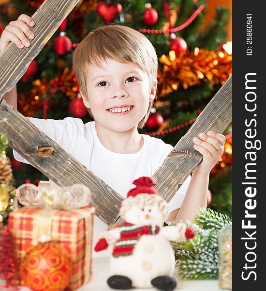 Happy Boy Playing In Christmas