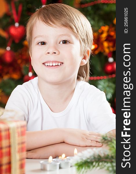 Portrait of happy boy against Christmas lights background. Portrait of happy boy against Christmas lights background