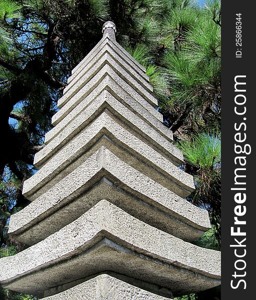 Traditional Japanese architecture, stone tower as symbol of the Buddhism. Traditional Japanese architecture, stone tower as symbol of the Buddhism